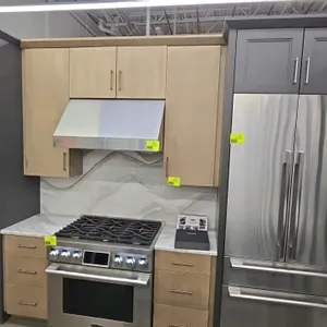 13' KraftMaid wood kitchen cabinet set. Includes upper and lower cabinets with solid surface countertop. Appliances not included.