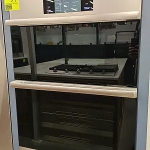 2022 Dacor DOC30M977DS built-in microwave and oven combination. Features a stainless steel finish, touchscreen control panel, upper microwave oven, an