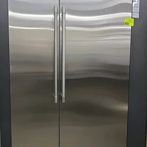 Monogram ZIR301NBRII / ZIF181NBRAII built-in side-by-side refrigerator and freezer combination unit. Features a stainless steel finish, tubular handle