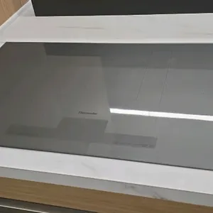 Thermador CIT367YG glass induction cooktop. Features touch controls. 36"W.