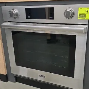 2023 Dacor DOB30T977SS 30" built-in convection oven. Features a stainless steel finish, dial controls with digital display, steam modes, and 3 interio