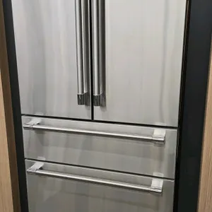 Thermador T36FL821NS French door refrigerator. Features a stainless steel finish, middle fresh food drawer, and bottom freezer drawer. Includes glass 