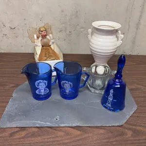 Glass Vase, Mini Shirley Temple Pitchers, Edgerton Fenton Art Glass Bell, Christmas Tree Topper, and Stone Slab
