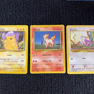 1999 Pokemon Base set #58 Pikachu; #60 Ponyta; #61 Rattata