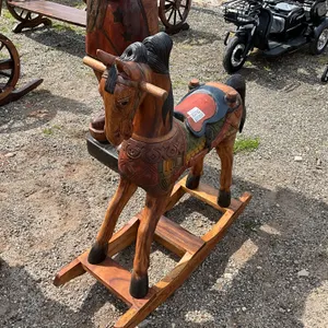 TEAKWOOD ROCKING HORSE, 46” L X 43” H