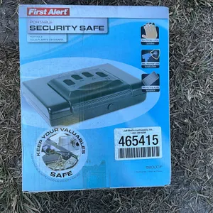UNUSED FIRST ALERT 5200DF DIGITAL BIOMETRIC QUICK ACCESS HAND GUN