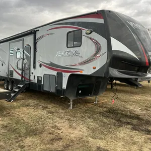 2014 VENGEANCE BY FOREST RIVER TIRAXLE FIFTH WHEEL HOLIDAY TRAILER W/ONAN CUMMINS GENERATOR, REAR RAMP DOOR, HYDRAULIC JACK, FUEL STATION PUMP  S/N: 4