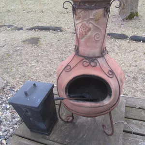 Clay Outdoor Wood Burner With Metal Frame