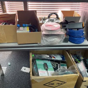 Lot of AssortedÂ Networking and Electronics Components Including Cables and Remotes