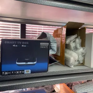 Lot of Smart TV Boxes, Power Inverter Unit, and Accessories