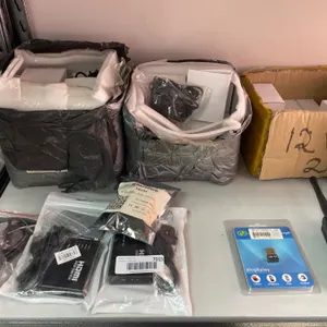 Lot of AssortedÂ Electronics, Including Two-Way Radios, Power Supplies, and Other Accessories