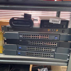 Lot of Assorted Networking Equipment Including D-Link Switches and Cables