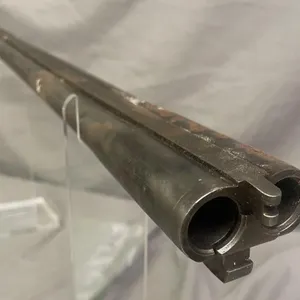 Unidentified SxS 12 gauge shotgun barrel.