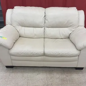 Beige Leather Love Seat - 67x34x34 inches (matches