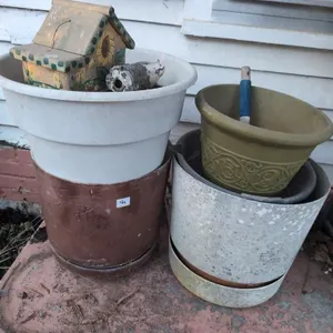Plastic flower pots and contents