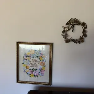 Music wreath decor and crosstitched picture