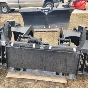 Seller #53.  Bobcat rock bucket with grab fork, like new