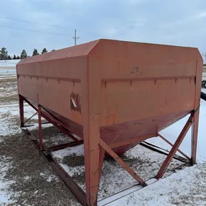 Seller #28. Two compartment seed tender, has two hydraulic auger.