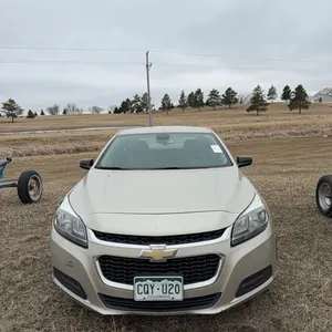 Seller #44. 2014 Chevy Malibu, mechanically sound, has some body damage, 128,000 miles, has been well maintained