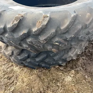Seller #72. 2 tires 20.8R42 some weather check cracks, decent tread