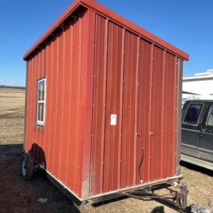 Seller #109. 	7x12 ice house, 8 hole, retractable gear, solar power, blown in insulation