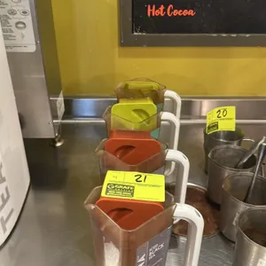 Teavana 1/2-gallon poly pitcher. Features clear plastic construction and includes a colored lid.