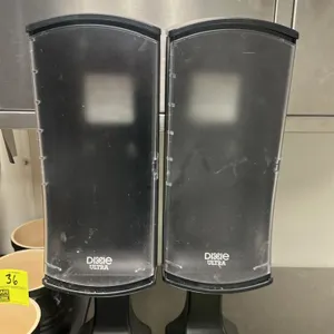 Dixie Ultra poly napkin dispenser. Features a black base and clear cover. Stand-mounted design.