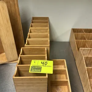 Assorted wood coffee creamer and sugar organizers. Includes various multi-compartment styles and a tall rotating organizer.