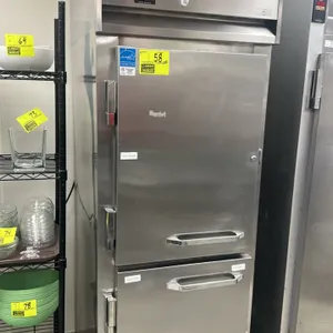 Continental Refrigerator 1R-SA-HD reach-in refrigerator. Stainless steel 2 half-door construction. Features top-mounted compressor and analog thermome