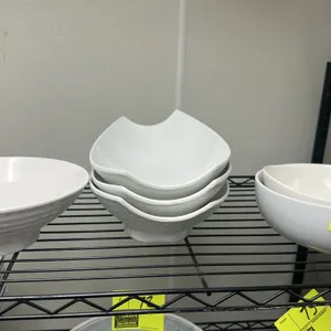 White poly bowl. Features assorted shapes.