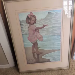 Framed Artwork of a Girl by the Sea Signed by Jessie Willcox Smith