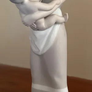 Lladro Porcelain Figurine of a Woman Holding a Child