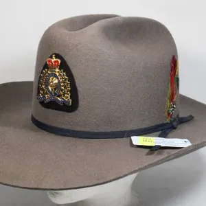 VINTAGE SMITHBILT COWBOY HAT WITH RCMP CAP BADGE