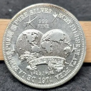1974 1 Troy Oz. Silver World Trade Unit Round