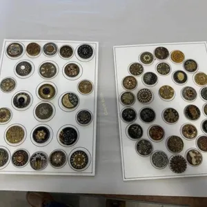 2 cards of Victorian celluloids, 54 buttons