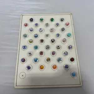 card of 41 paperweights, mostly Peter Ben