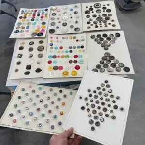 11 cards of shell buttons