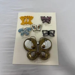 card of 6 butterfly buckles including Satsuma