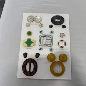 card of 7 buckles with matching buttons