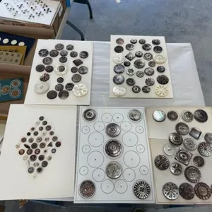 4-plus cards of carved shell buttons