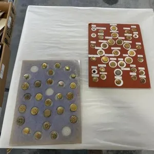 2 cards of Golden Age buttons