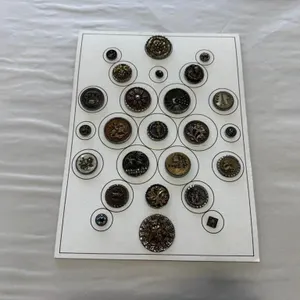 25 steel cups, including wood & shell backgrounds