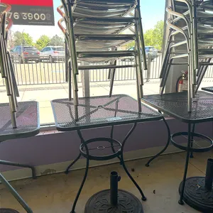 (4) Metal Patio Chairs and Square Mesh Table with Umbrella Base, 27in x 27in