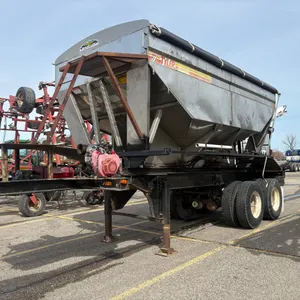 Tyler 15' stainless steel seed tender on tandem axle trailer