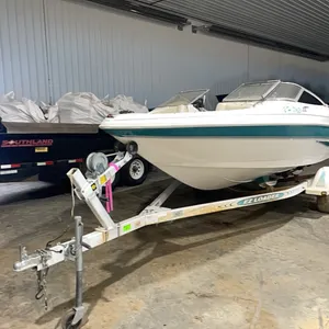 Larson Bow Rider Runabout Boat, SN: LAR51959L798 with EZ Loader Trailer, no visible serial number
