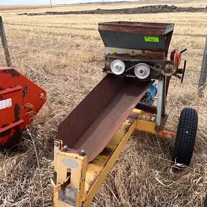 Small Robin Grain Roller on Transport with 1.5 hp electric motor.