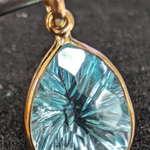 10K CARVED B.TOPAZ (3CT) PENDANT, SUGGESTED RETAIL VALUE $600