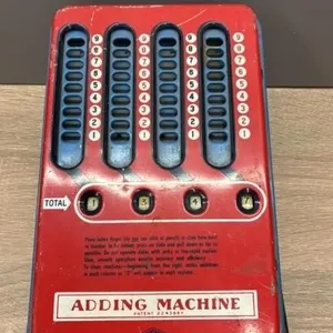 1950�s Wolverine Supply Tin Adding Machine.