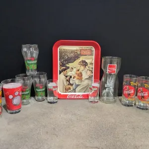 Coca cola collectors glasses and metal tray
