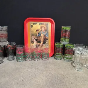 Coca cola collectors glasses and metal tray
